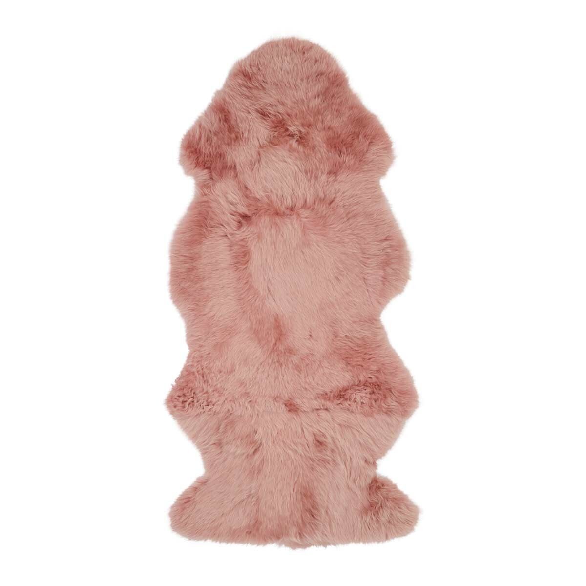 Langt saueskinnteppe i ull 135 cm Rosa
