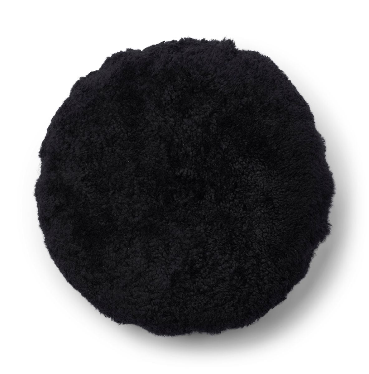 Saueskinnpute | Korthåret | New Zealand | Dobbeltsidig | Ø40 cm Svart